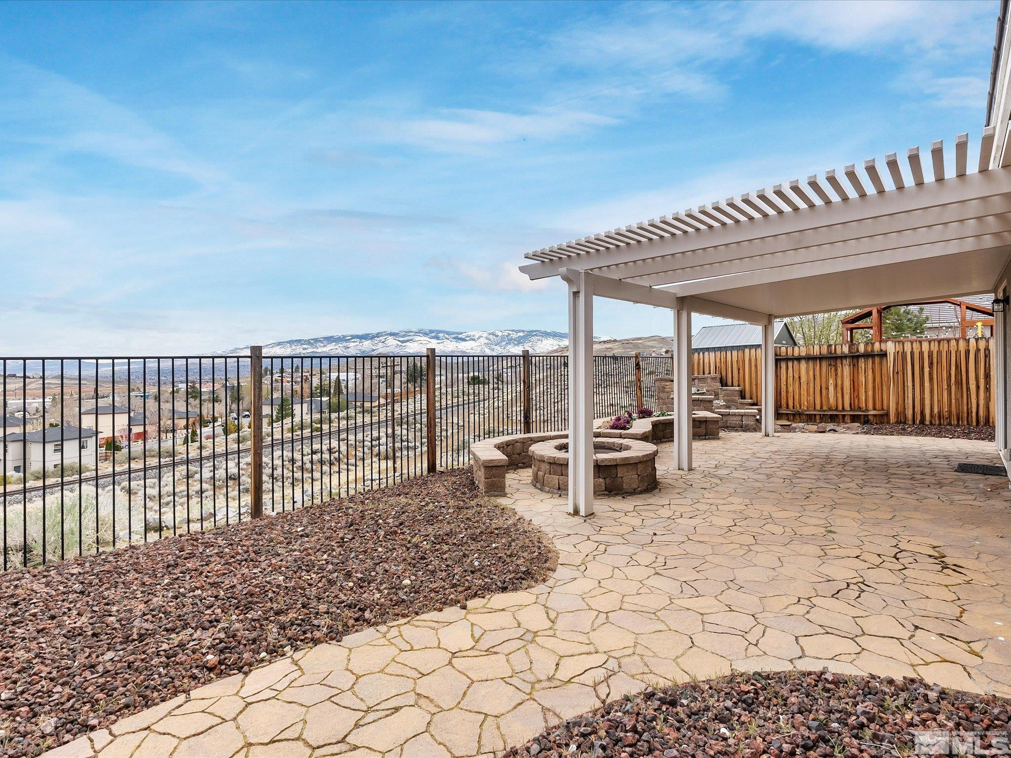 1448 Hagar Road Reno, NV 89506 - Photo 27 of 38 a view of a swimming pool and lounge chairs