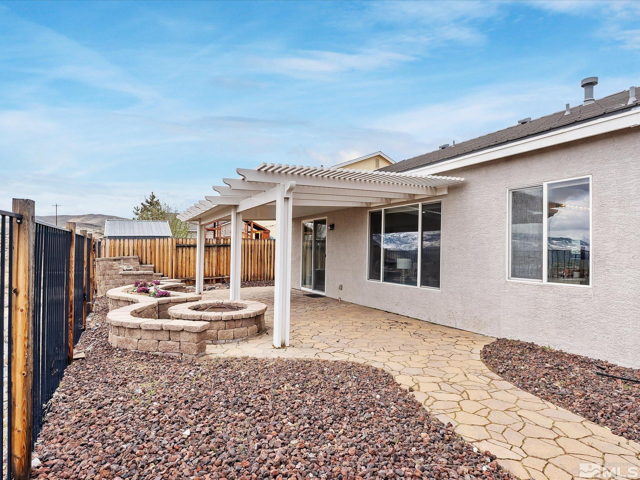 1448 Hagar Road Reno, NV 89506 - Photo 28 of 38 a front view of a house with a yard
