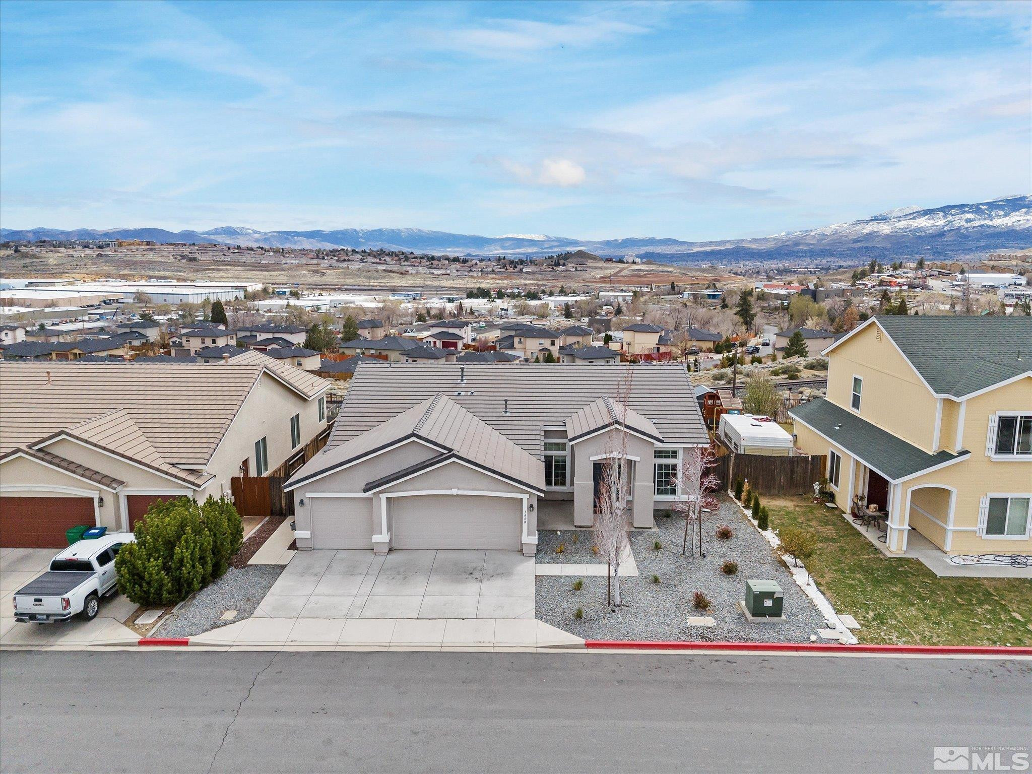 1448 Hagar Road Reno, NV 89506 - Photo 31 of 38 an aerial view of residential houses with city view