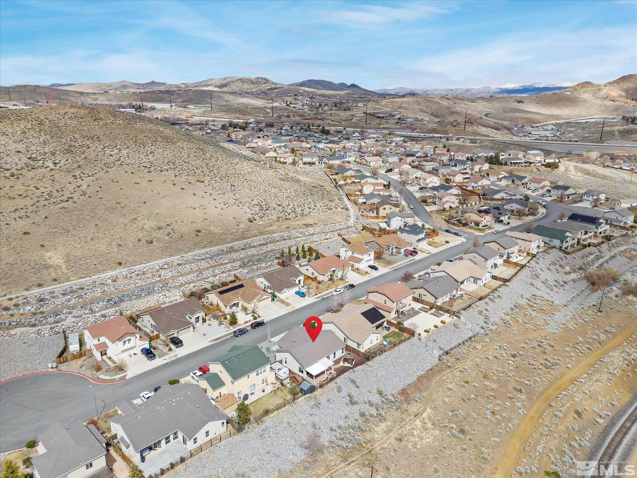 1448 Hagar Road Reno, NV 89506 - Photo 34 of 38 an aerial view of residential houses with outdoor space