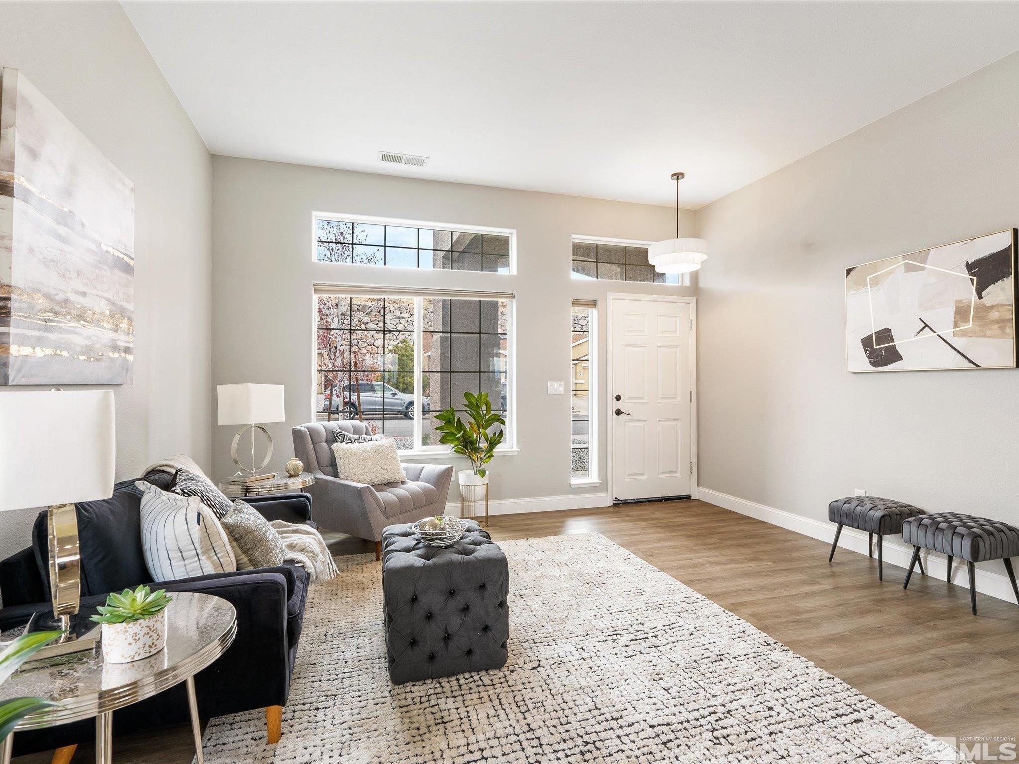 1448 Hagar Road Reno, NV 89506 - Photo 5 of 38 a living room with furniture and a large window