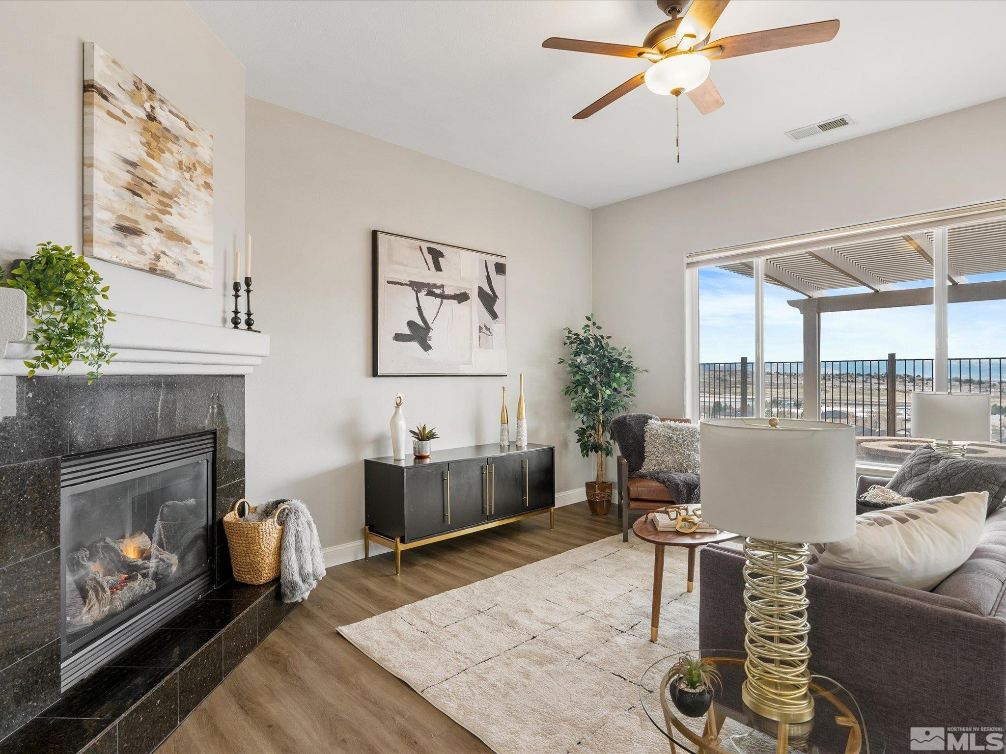 1448 Hagar Road Reno, NV 89506 - Photo 7 of 38 a living room with furniture and a fireplace