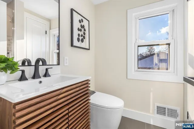 a bathroom with a sink and a toilet