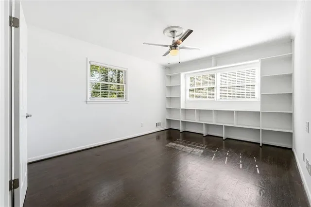 a view of a room with cabinet and a window