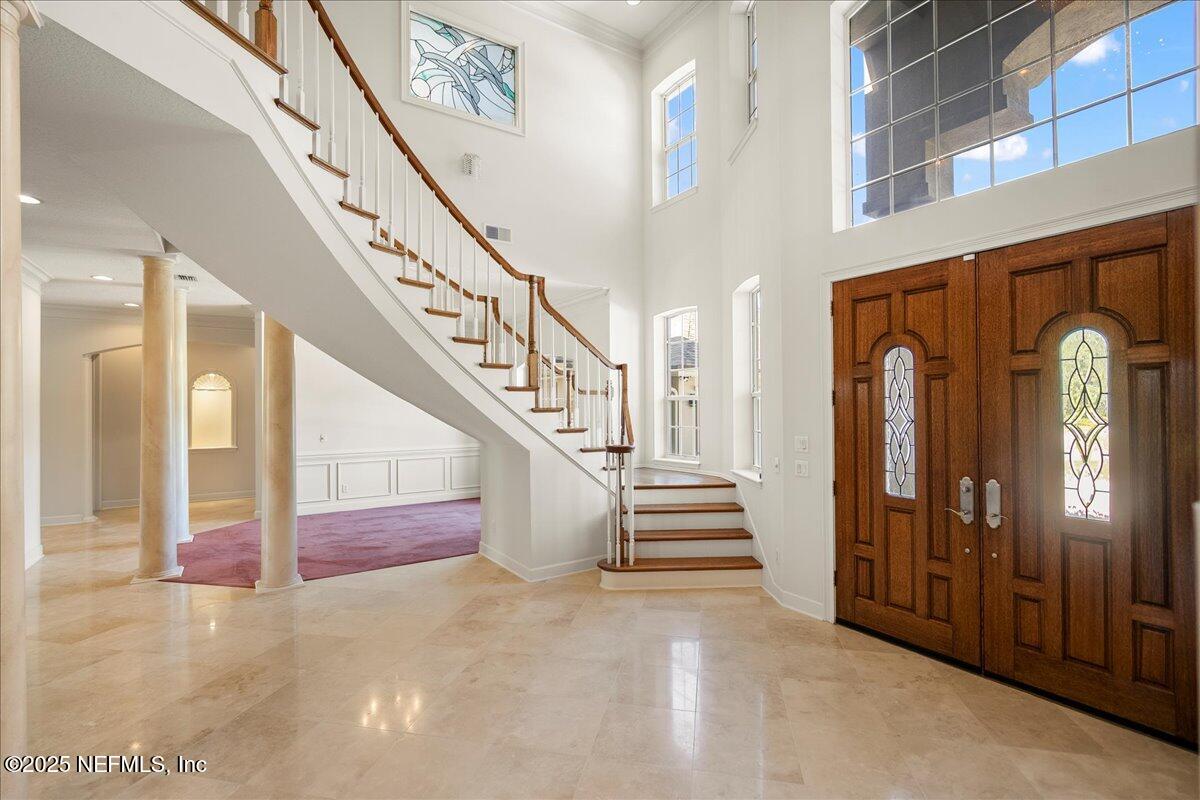 9919 Blakeford Mill Road Jacksonville, FL 32256 - Photo 14 of 88 Entryway to stairs and dining room