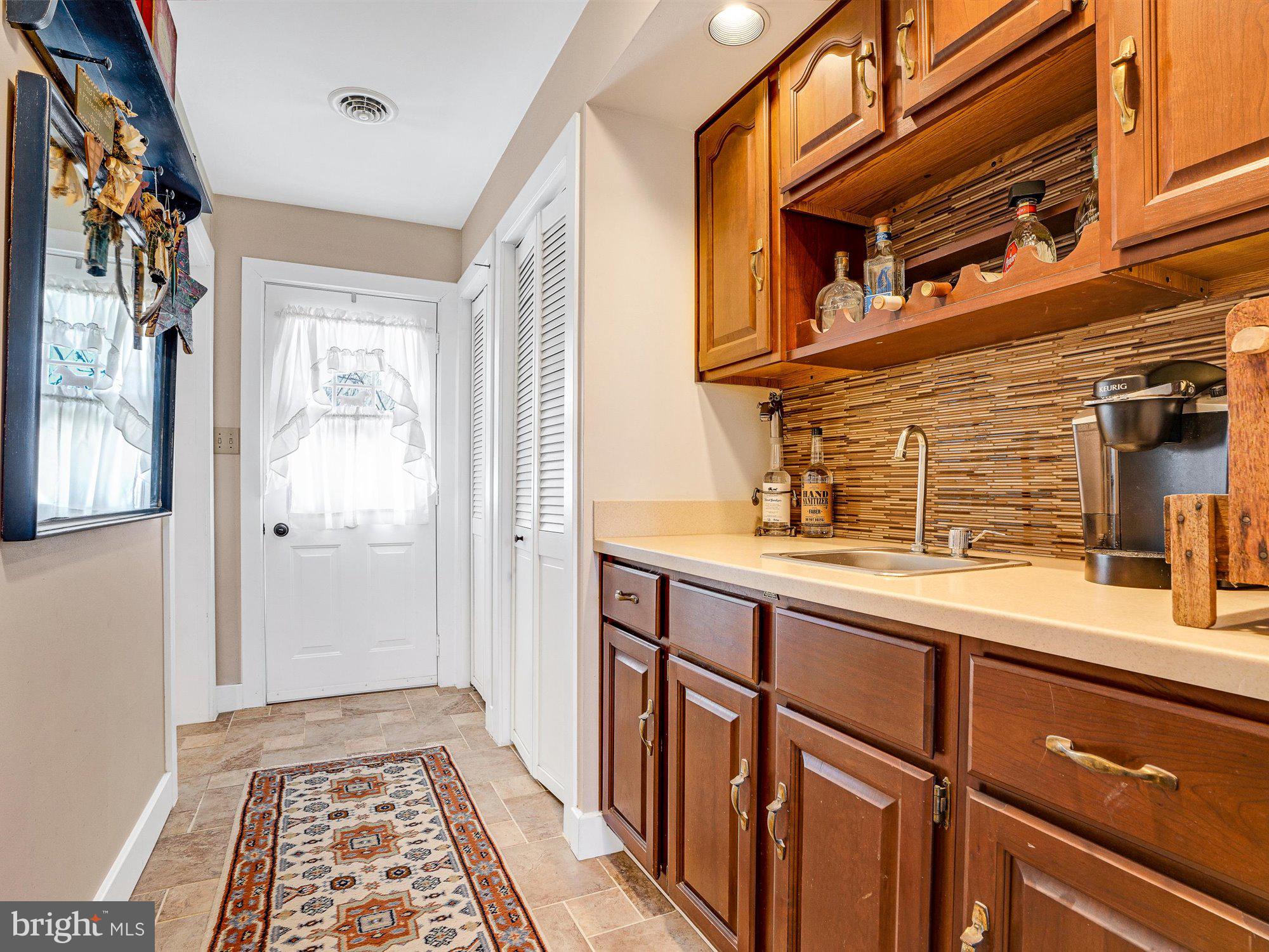 153 Locust Grove Road Dillsburg, PA 17019 - Photo 15 of 58 Wet bar for all of your entertaining needs.