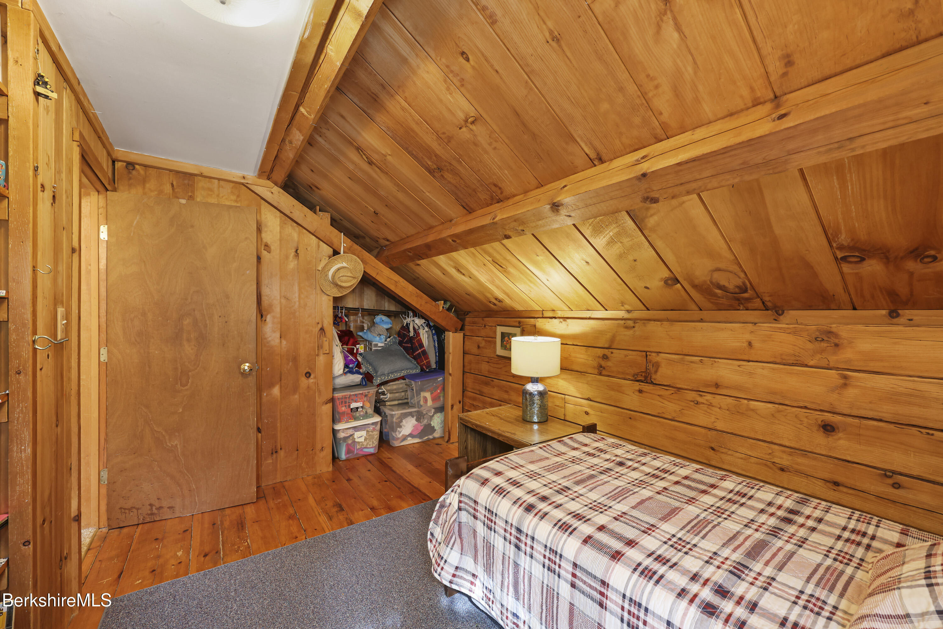 78 East Main Road Peru, MA 01235 - Photo 34 of 56 a bed room with a bed and a table