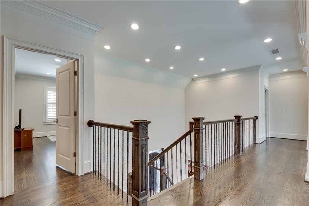187 Fontaine Road Southwest Mableton, GA 30126 - Photo 57 of 84 a view of a hallway with wooden floor