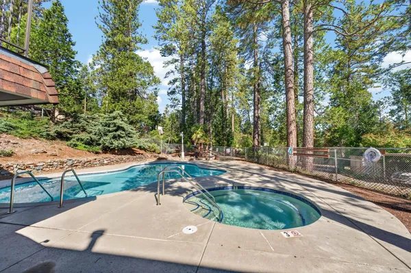 a view of a backyard with a patio