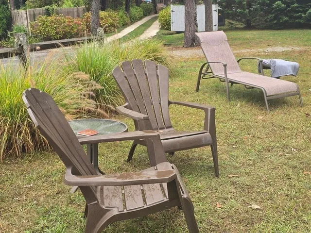 a view of a swimming pool with a lounge chair
