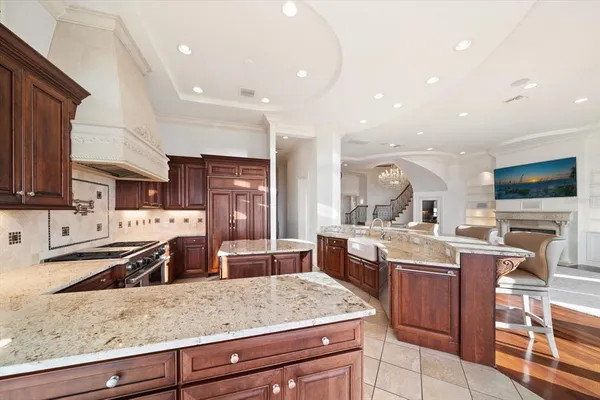 a bathroom with a toilet a sink and shower
