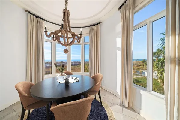 a view of a room with wooden floor and staircase