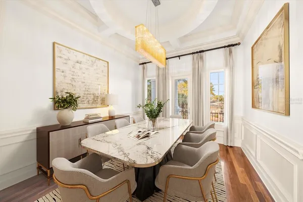 a bathroom with a toilet a sink and a mirror