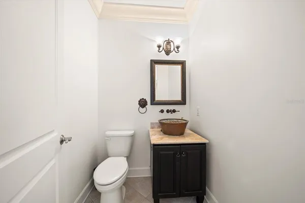 a view of entryway with wooden floor and a chandelier