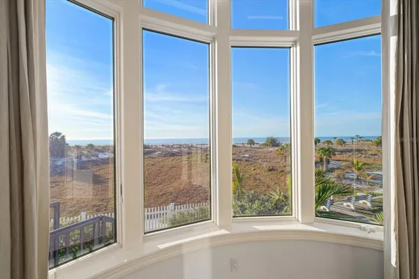 a view of a room that has a window in it