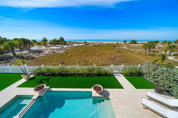 a living room with furniture fireplace and flat screen tv