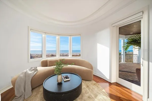 a utility room with stainless steel appliances granite countertop a sink a stove and dishwasher with wooden cabinets