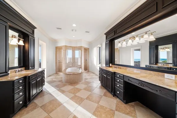 a view of a patio with a table and chairs