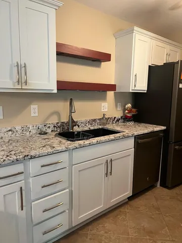 $265,000 | 1315 North Sunnyslope Drive, Unit 202, Mount Pleasant, WI 53406