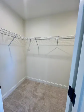 a view of a room with racks on the wall