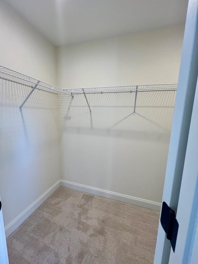 7015 Spring Walk Drive Columbus, GA 31904 - Photo 21 of 28 a view of a room with racks on the wall