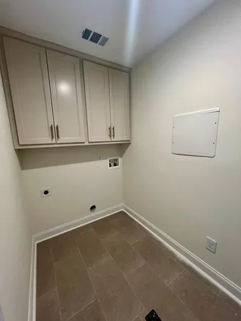 a view of room with cabinets