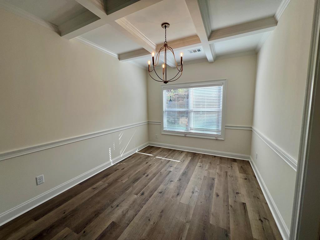 7015 Spring Walk Drive Columbus, GA 31904 - Photo 7 of 28 a view of empty room with wooden floor and fan