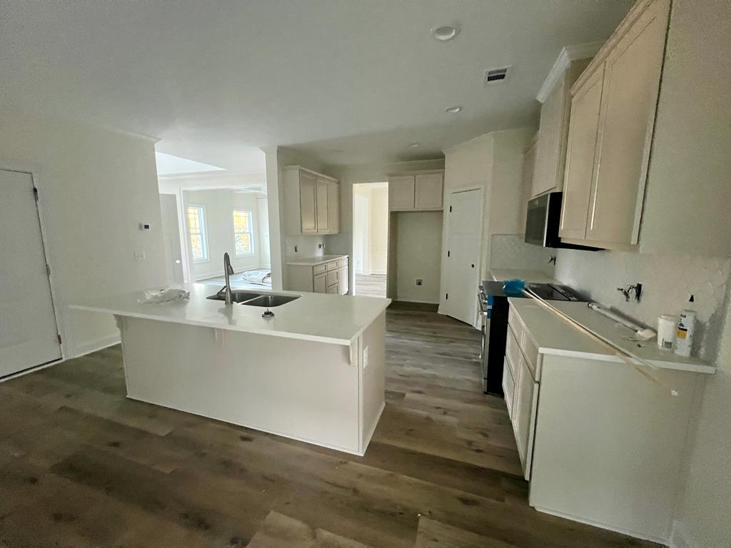 7015 Spring Walk Drive Columbus, GA 31904 - Photo 10 of 28 a view of living room with stainless steel appliances wooden floor and view living room