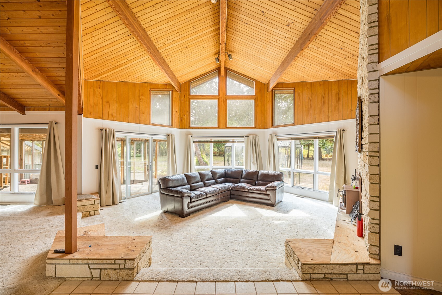 1175 Cameron Road Sequim, WA 98382 - Photo 13 of 39 a living room with furniture and a window