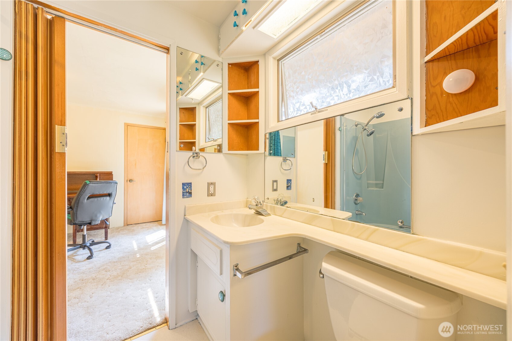 1175 Cameron Road Sequim, WA 98382 - Photo 30 of 39 a bathroom with a sink a mirror and a shower