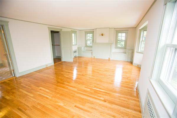 281 Glen Road Weston, MA 02493 - Photo 12 of 18 a view of empty room with window and wooden floor