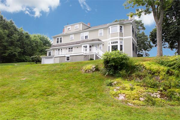 281 Glen Road Weston, MA 02493 - Photo 17 of 18 a view of a house with a big yard and large trees