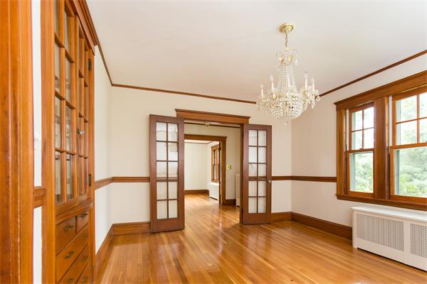281 Glen Road Weston, MA 02493 - Photo 4 of 18 a view of a room with wooden floor and windows