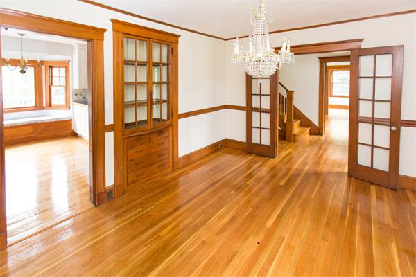 281 Glen Road Weston, MA 02493 - Photo 5 of 18 a view of empty room with wooden floor and windows