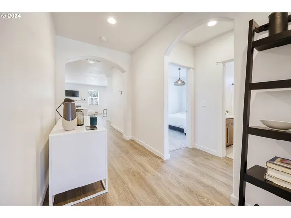 a hallway with a wooden floor