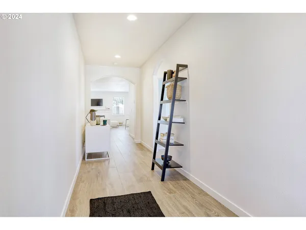 a view of entryway with wooden floor