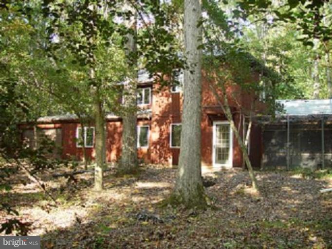 6 Old Mill Bottom Road North Annapolis, MD 21409 - Photo 1 of 1 a backyard of a house with lots of green space