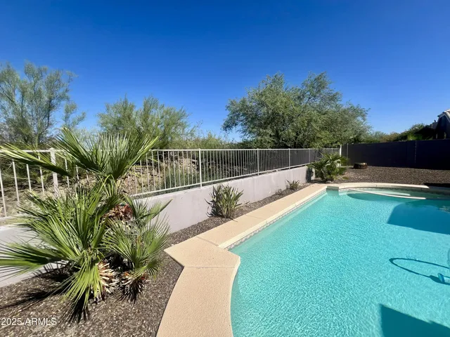 a view of a yard with a patio