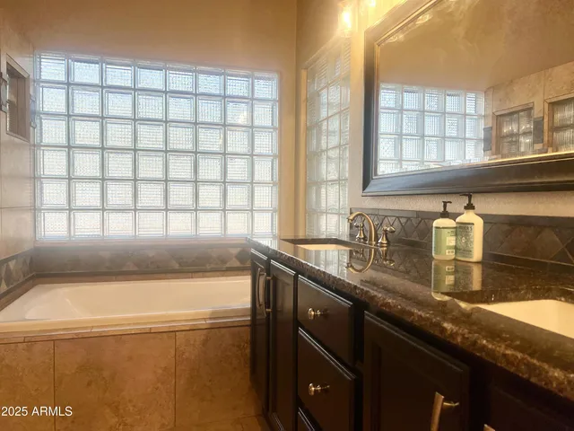 a kitchen with a sink and a window