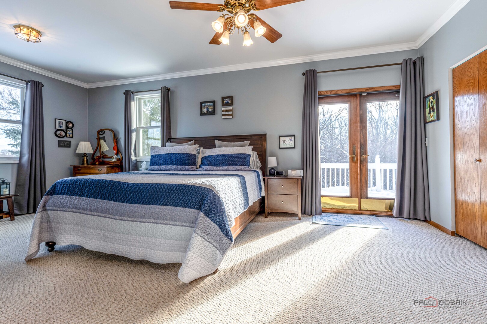 25900 North St Marys Road Libertyville, IL 60048 - Photo 24 of 56 a bedroom with a bed and a chandelier