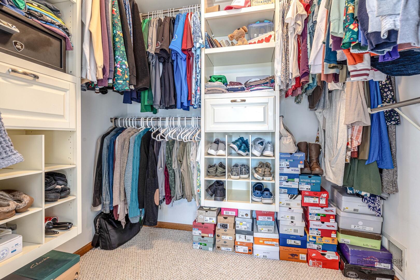 25900 North St Marys Road Libertyville, IL 60048 - Photo 28 of 56 a view of walk in closet with clothes and shoes