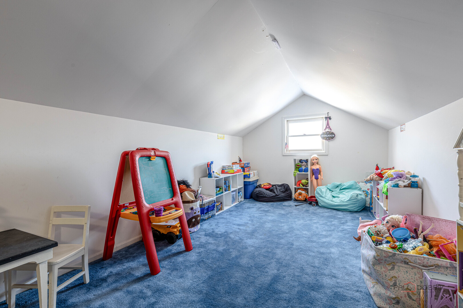 25900 North St Marys Road Libertyville, IL 60048 - Photo 33 of 56 a children room with toys and a wooden floor