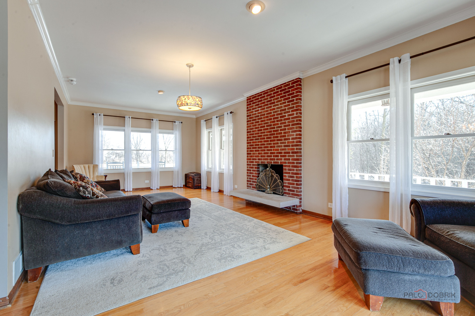 25900 North St Marys Road Libertyville, IL 60048 - Photo 10 of 56 a living room with furniture and a fireplace