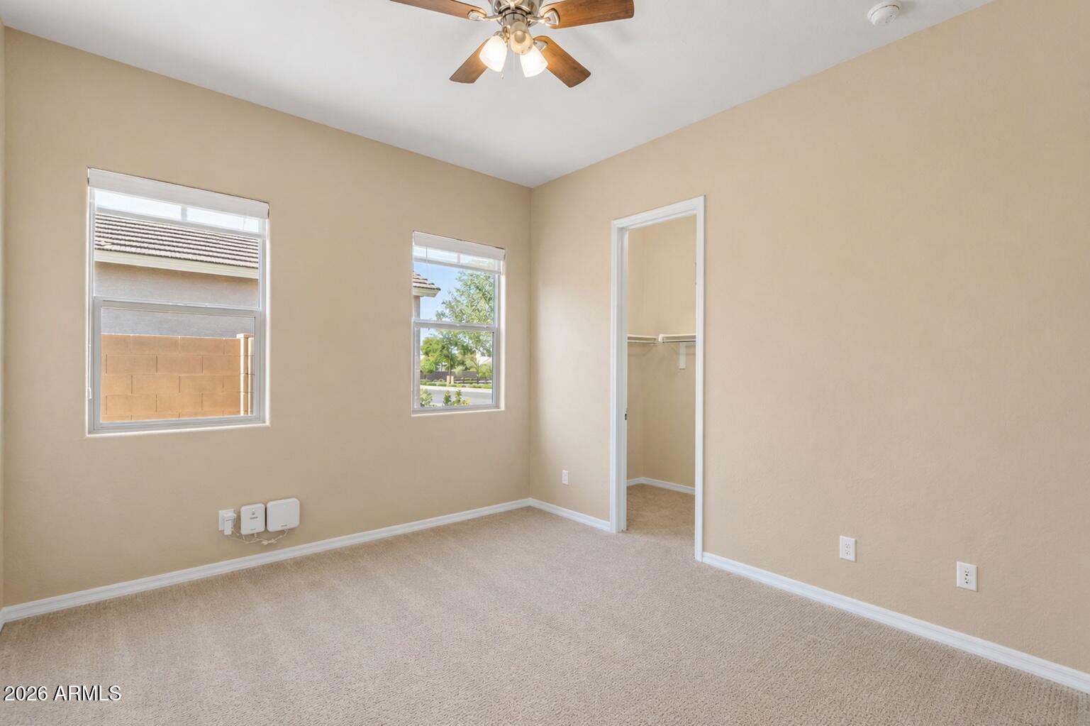 2827 East Muirfield Street Gilbert, AZ 85298 - Photo 28 of 55 Bedroom 2 with walk in closet