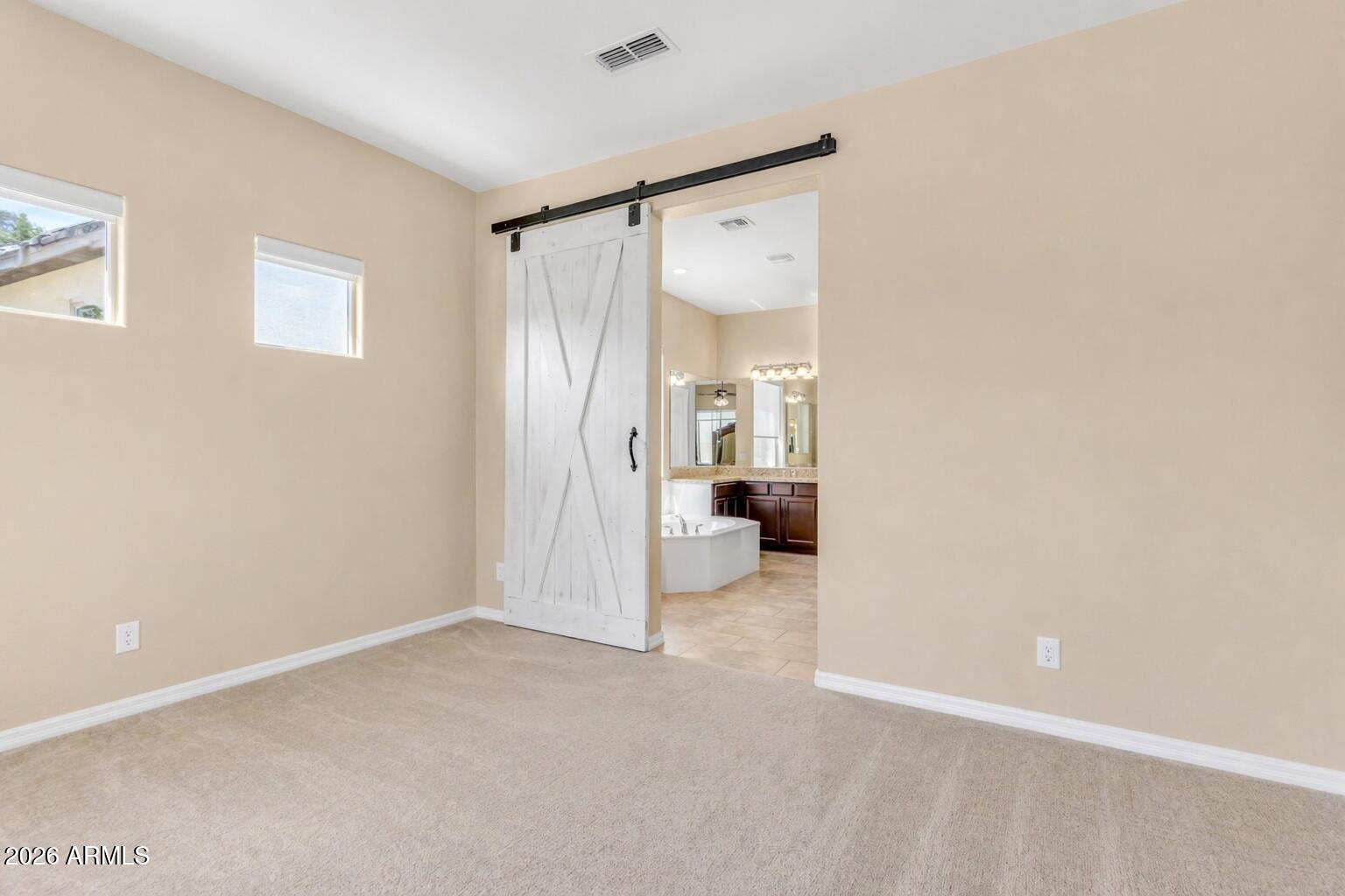 2827 East Muirfield Street Gilbert, AZ 85298 - Photo 33 of 55 Primary Bedroom