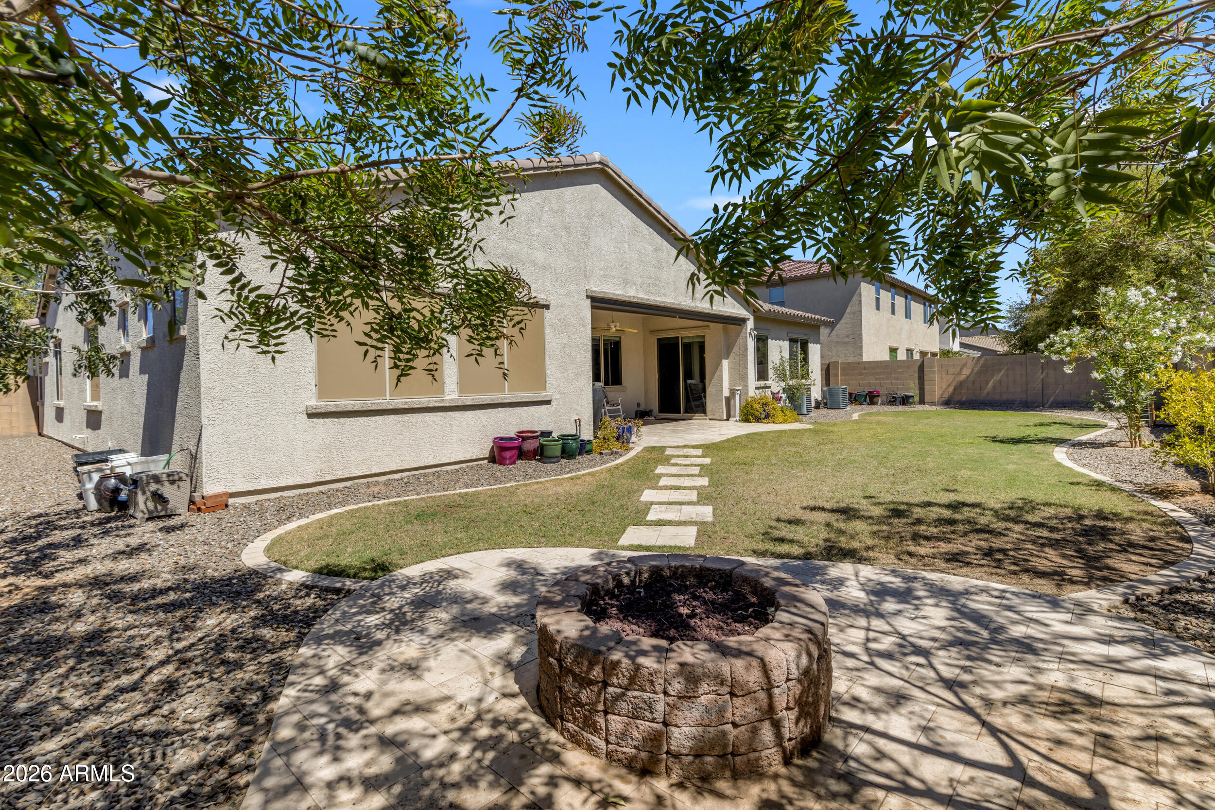 2827 East Muirfield Street Gilbert, AZ 85298 - Photo 40 of 55 backyard with firepit