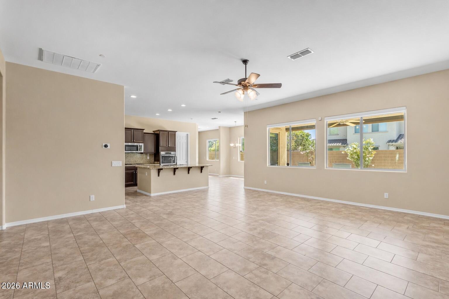 2827 East Muirfield Street Gilbert, AZ 85298 - Photo 7 of 55 Living Room Angle 2
