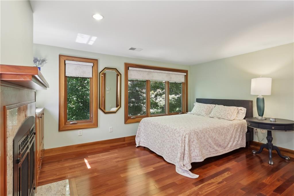 542 North Monroe Street Butler, PA 16001 - Photo 21 of 39 a bedroom with a bed mirror and window