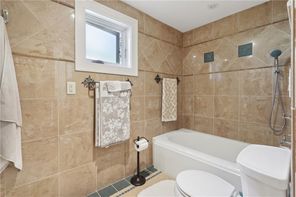 542 North Monroe Street Butler, PA 16001 - Photo 24 of 39 a bathroom with a toilet and shower