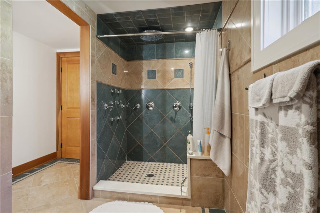 542 North Monroe Street Butler, PA 16001 - Photo 25 of 39 a bathroom with a glass shower door